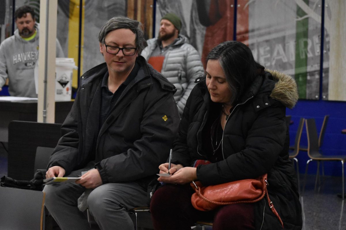 Voters circle on their ballots the name of their candidate of choice at the Brooklyn Precinct during the Iowa caucus on Jan. 15, 2024.