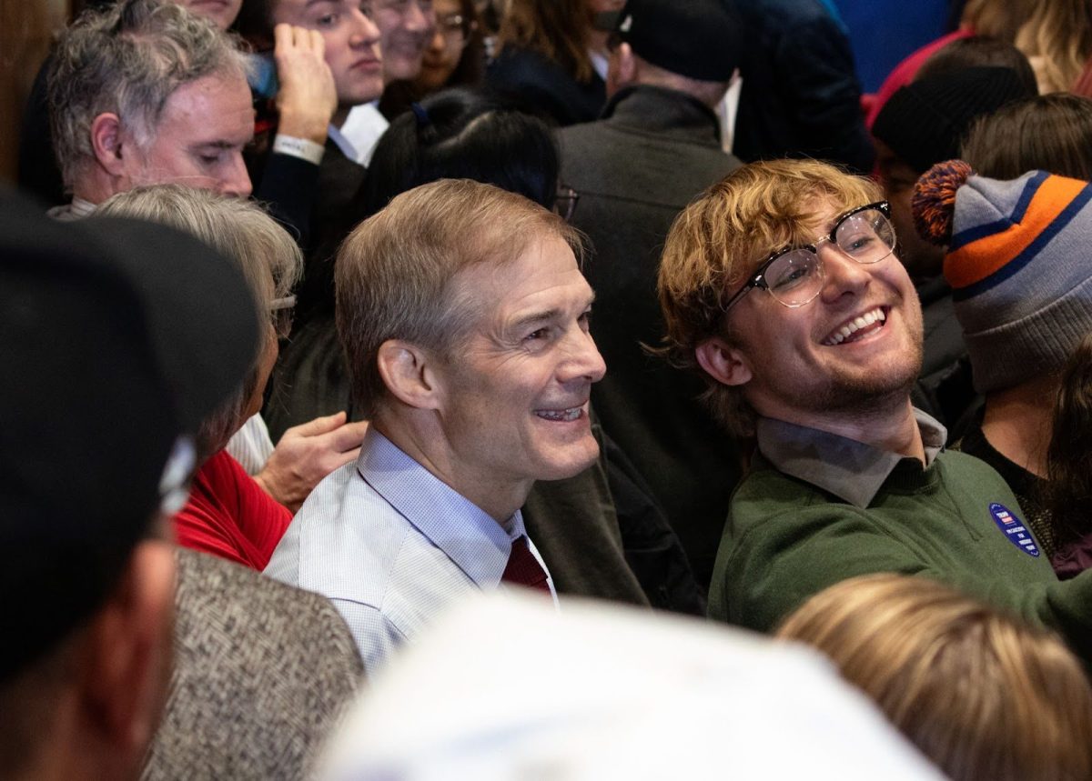Ohio State Representative Jim Jordan poses for a photo with an attendee. Jordan is a prominent endorser of Trump who attended the event to show support among other prominent figures like former Representative Billy Long, Mayor of Knox County, Tennessee Glenn “Kane” Jacobs and far-right activist Laura Loomer. 