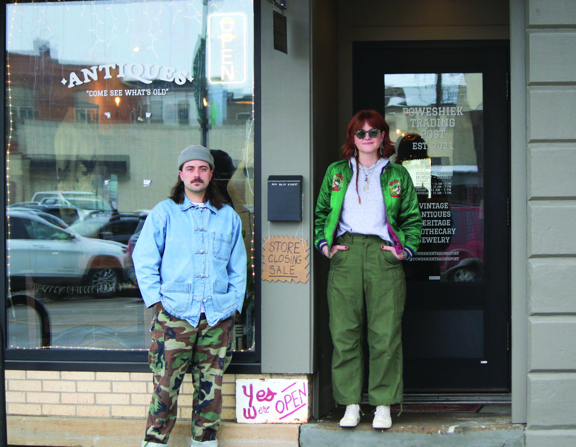 From left: Cameron and Ren Fischer, owners of Poweshiek Trading Post at 829 Main St. plan to close their vintage shop to customers March 1. 