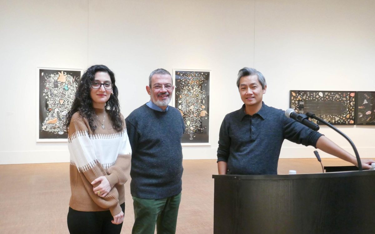 From left: Literary translators and guest readers A. J. Javaheri and Aron Aji stand with Hai-Dang Phan, new director of Writers@Grinnell, in the Grinnell College Museum of Art.