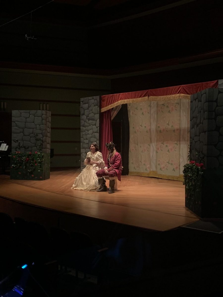 From left: Sarah Rosales as Belle and Hayden Smith as the Beast perform on the stage of Sebring-Lewis Hall. (Contributed by Bruna Foss)