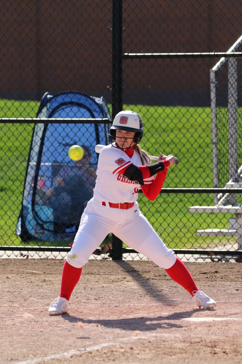 Lindsey Schultz `27 swings at the ball.