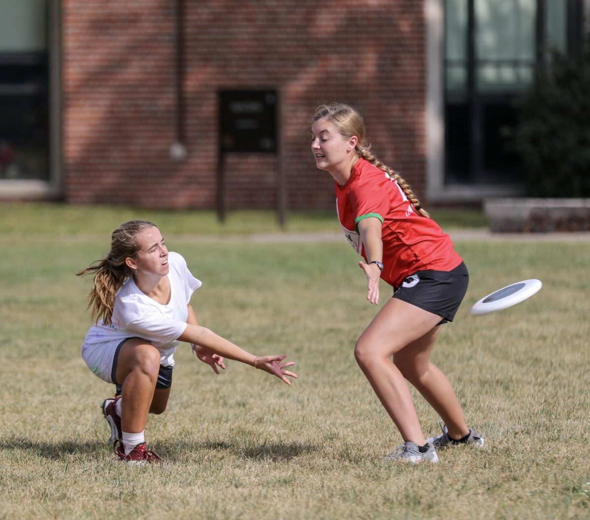 Lucy Leither `25 throws the frisbee to a teammate during a game for the Elephantitis tournament.