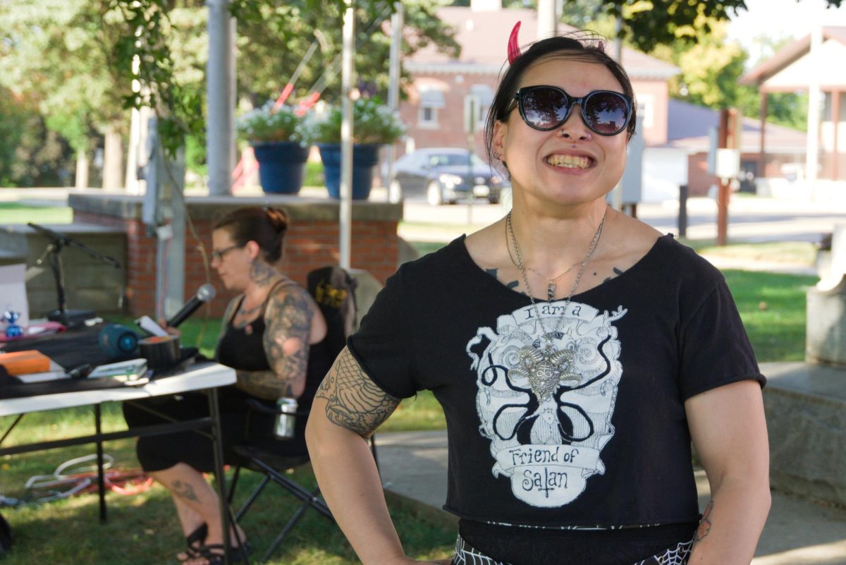 Toki Leonard answers interview questions at the Satanic Temple of Iowa’s Paradise Lost: Reading Marathon event at the Tama County Courthouse lawn on Tues., Sep. 17, 2024.
