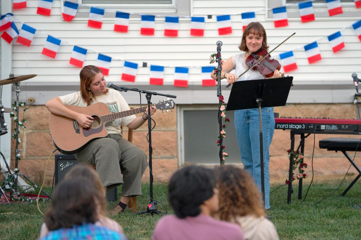 From left: Frannie Crego '25 and Maddie Church '27 perform at Maison a la Musique.