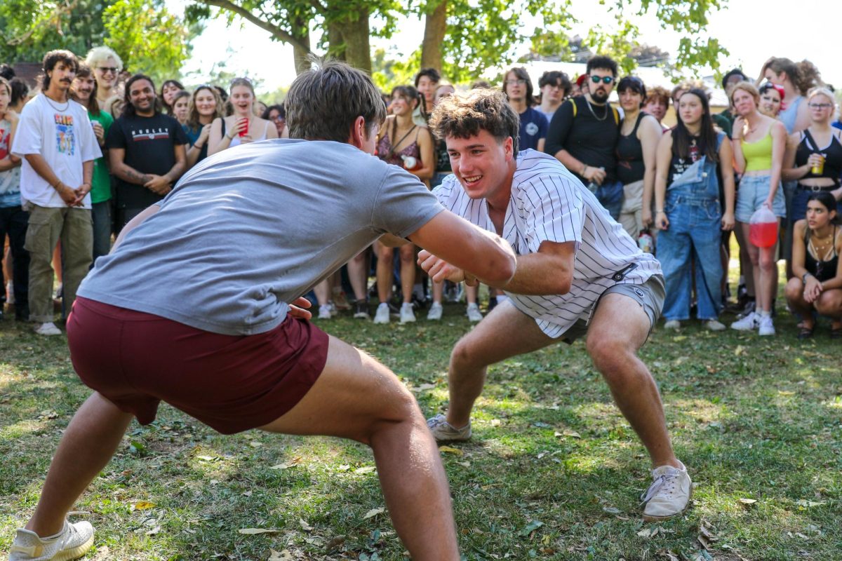 Joe Chanis '27 (right) prepares to wrestle an opponent.