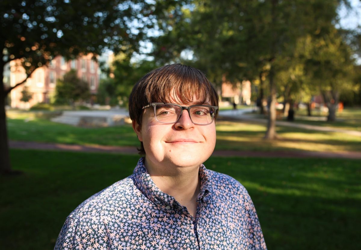 Reed Karkula `27 poses for a portrait by the Commencement Stage on Wednesday, October 9.