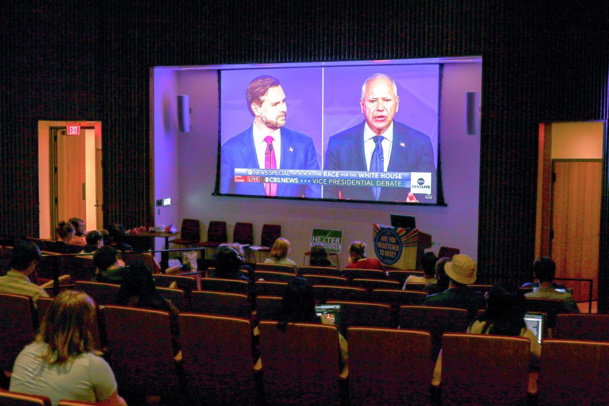 Students watch the vice presidential debate on October 1, 2024.