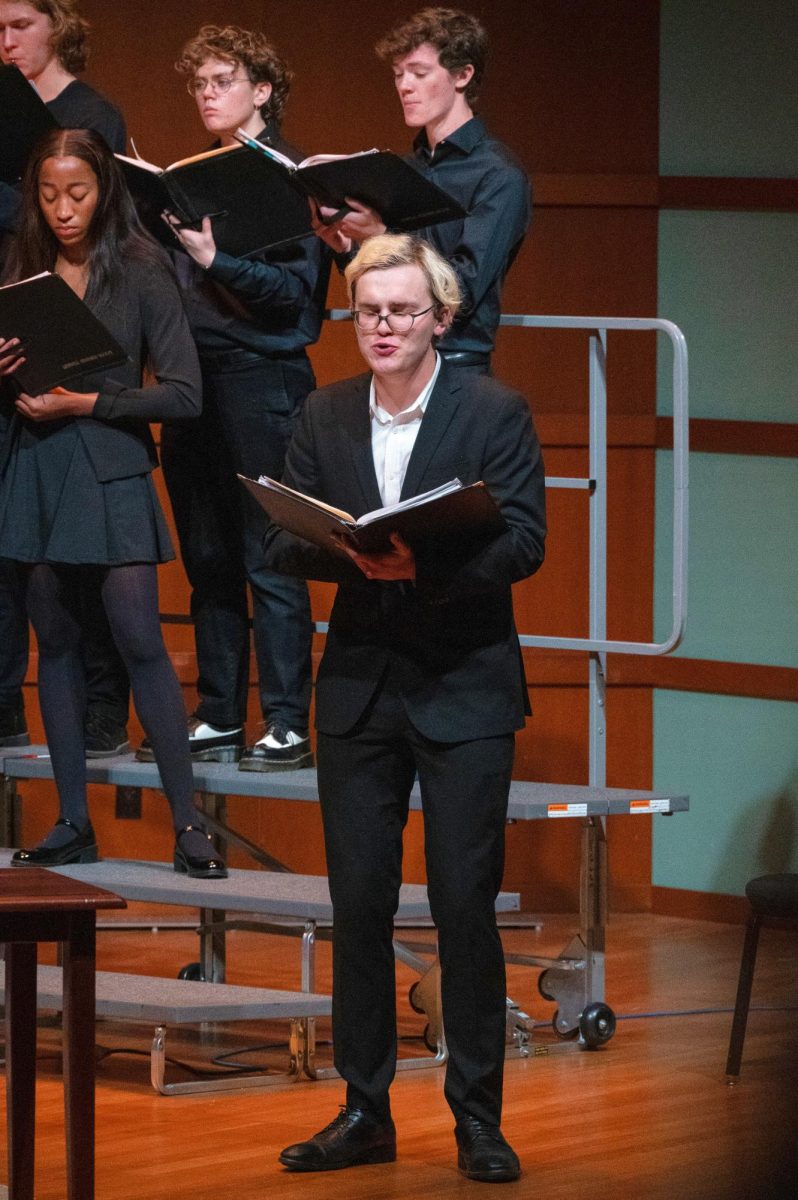 Beau Leavenworth `25 preforms a solo for Grinnell Singers in Sebring-Lewis Hall in Grinnell, Iowa on Sunday, Nov. 10.