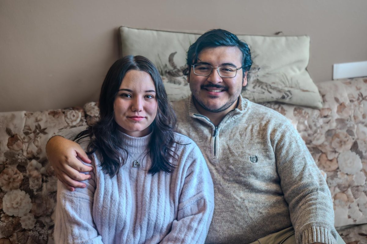 From left: Erin Vazquez and Darian Vazquez `26 pose for a photo.