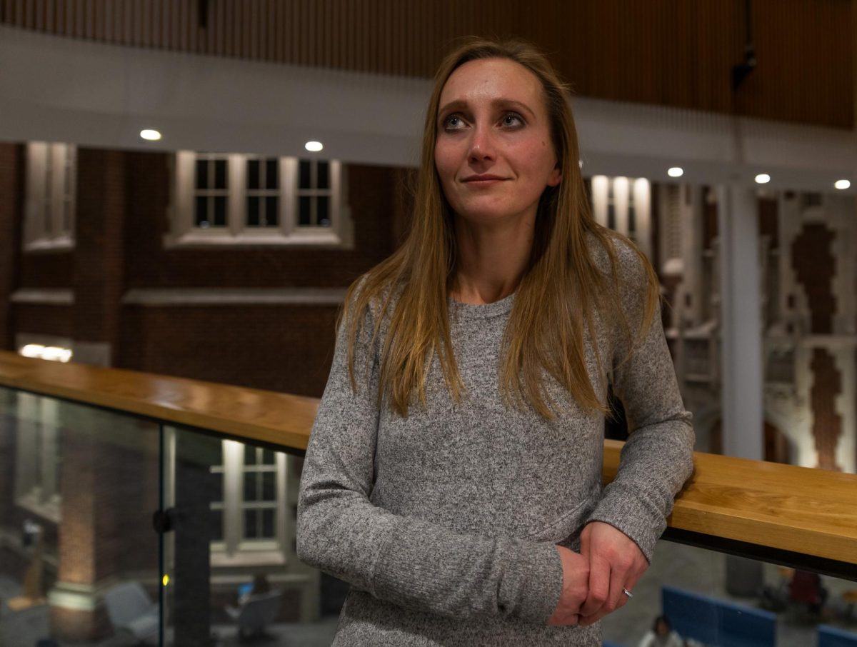 Jessica Calarco, author of "Holding It Together: How Women Became America's Safety Net," poses for a portrait after her talk at Grinnell College on Nov. 11, 2024.