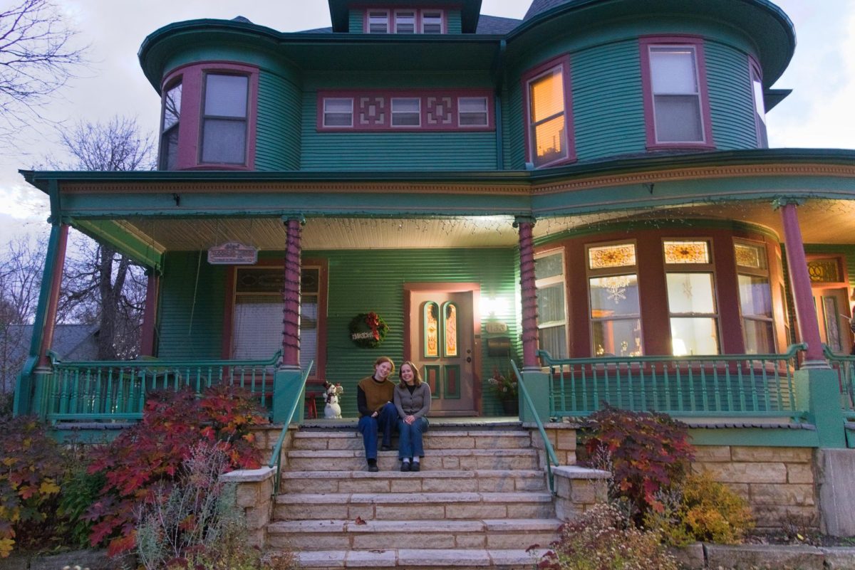 From left: Maddie Hartog `25 and Mira Diamond-Berman `25 pose for a photo in front of Carriage House on Nov. 19, 2024.