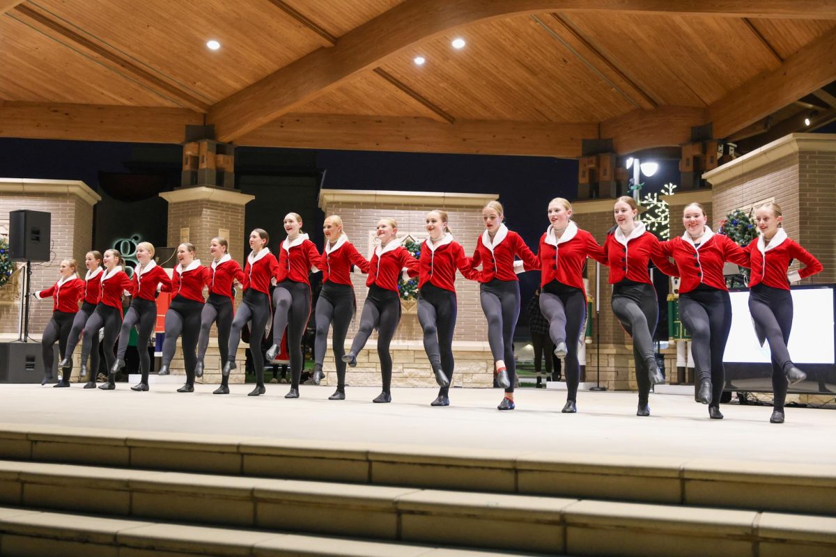 Dancers from Michelle’s Dance Company and Stepping Out Dance Studio perform during the open ceremony to kick off Jingle Bell Holiday.