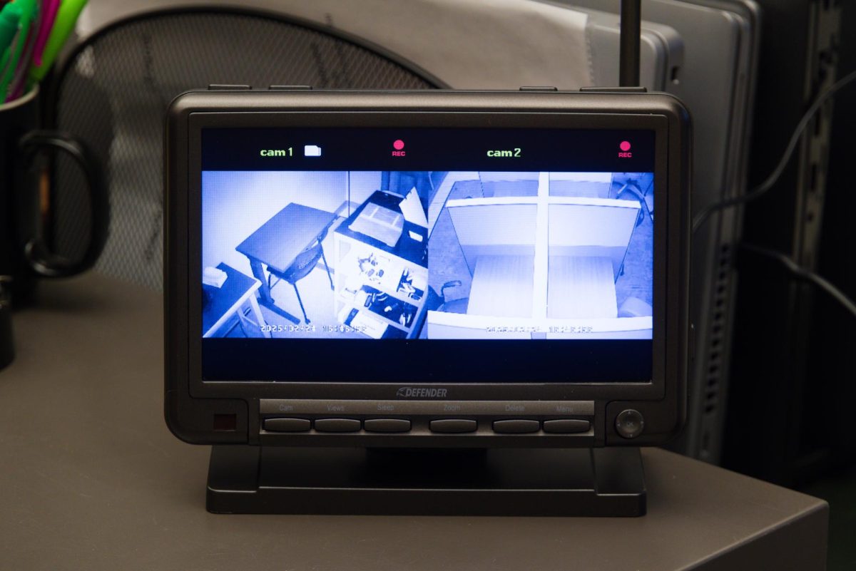 Security camera monitor in Disability Resource Center on Disability Resources Operations Coordinator Stacy Turley's desk. 