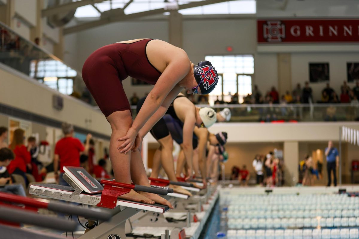 Natasha Zettler '27 prepares to dive into the pool for her 400-yard Individual Medley Final.