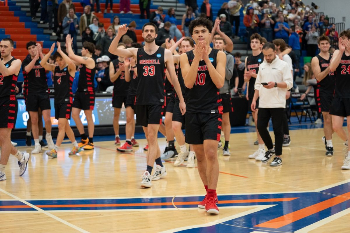 Grinnell Men's Basketball wave to fans after their NCAA D-III Tournament Game against UW-Platteville on Friday, Mar. 7.
