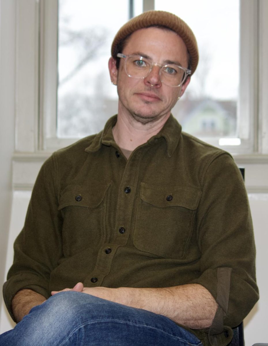 Jordan Reznick, Assistant Professor of American Studies poses in the Humanities and Social Studies Center (HSSC). 