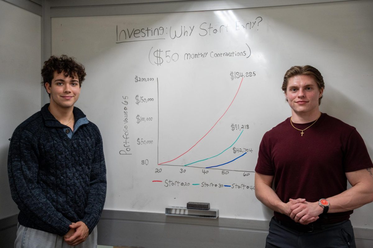From left: Alex Smith and Peyton Williams, both `27, pose in Burling Library on April 18, 2025.