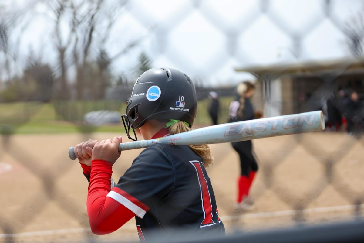 Lindsey Schultz (11) focuses on the pitcher's throw during a game against Lake Forest on Saturday, Apr. 5.