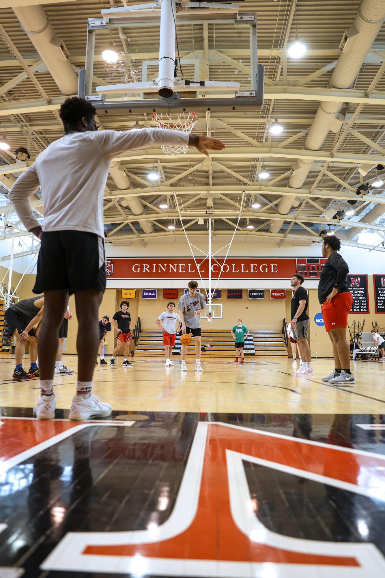 Tolu Johnson `25 stands at the baseline as Dillon Gestring `25 shoots a free throw during an Intramural game on Saturday, April 19.
