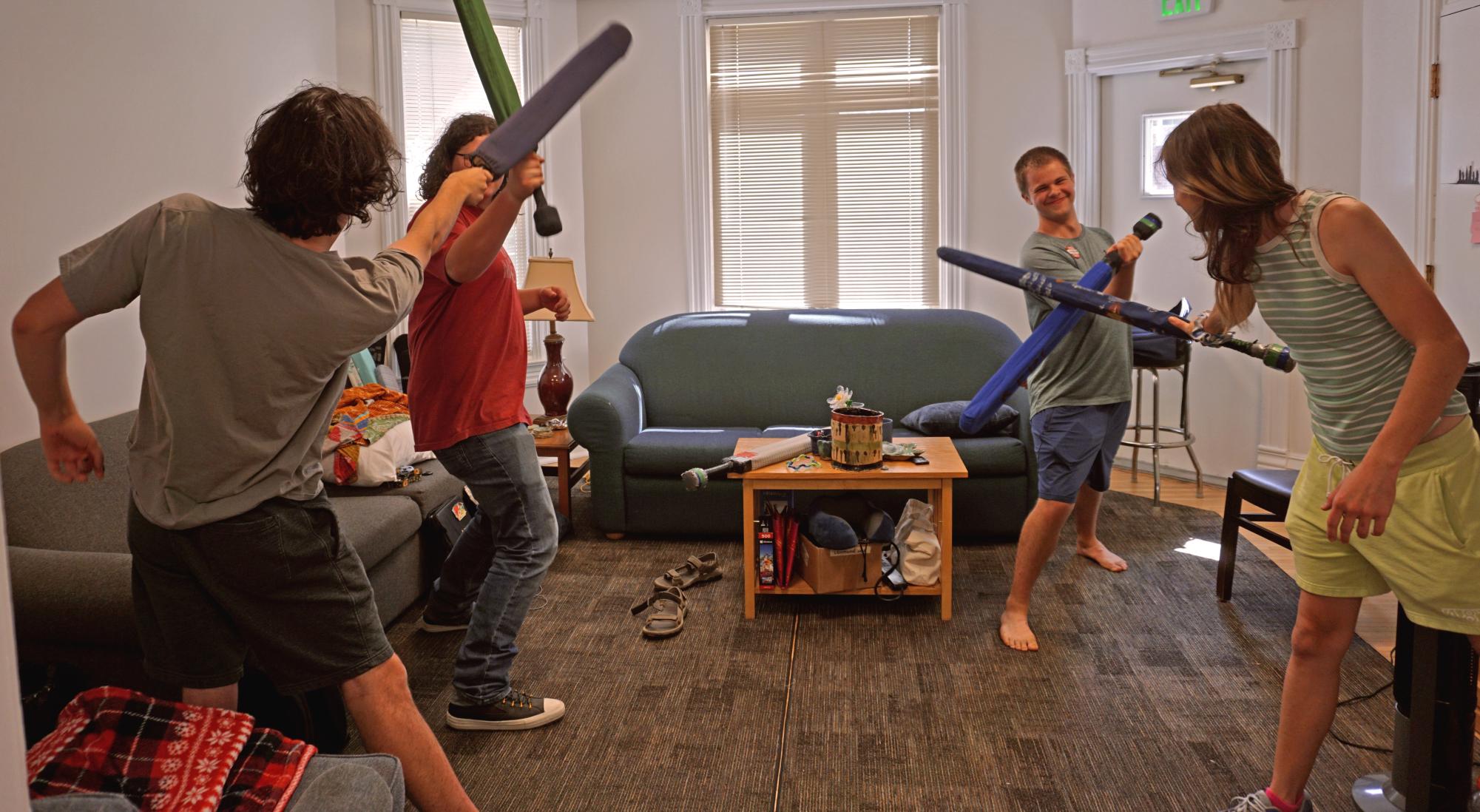 From left: Duels and Games (DAG) members Henry William `28 “Elk” and Charlotte Wade `26 “Scary Yarn” battle as Boston Gunderson `26 “Philly” and Jasper Butler-Kurth `28 “Pink” engage in combat.