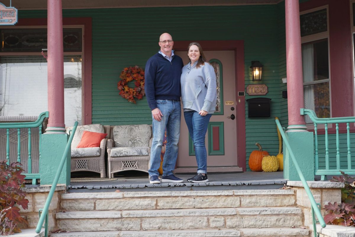 From left: Evan Petig `98 and Abby Petig `01, the new owners stand outside the now named Grinnelian, on Nov. 17, 2025.