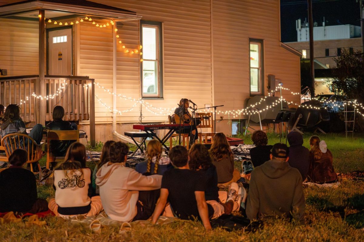 Madeline Church `27 performs a song at Farmstock on Oct. 10, hosted at Farm House. Under the restructuring of the residential life staffing model, Farm House will move to 1128 East Street, where GAME House currently operates.