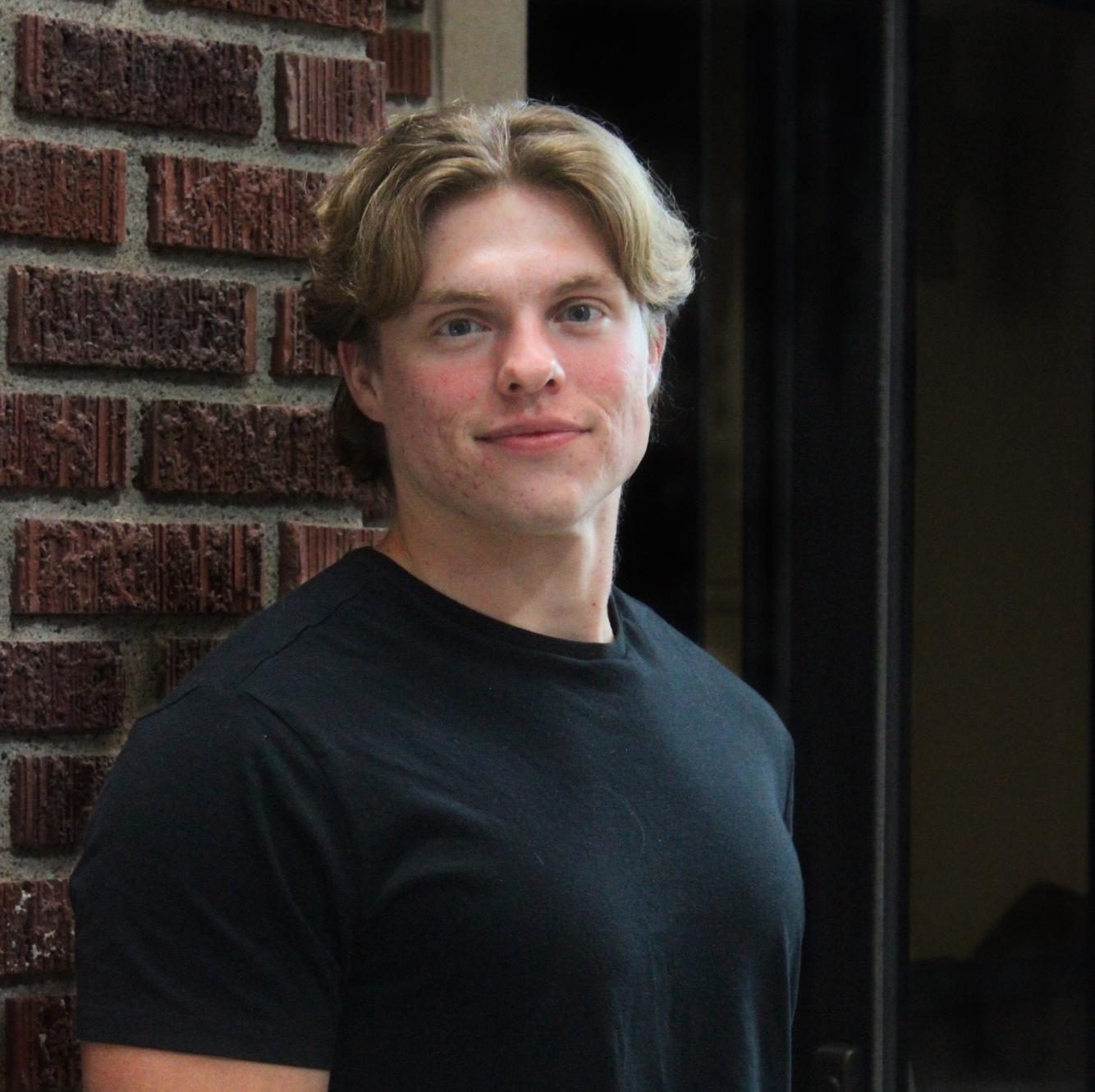 Peyton Williams `27 weighs the pros and cons of credit building as a college student.