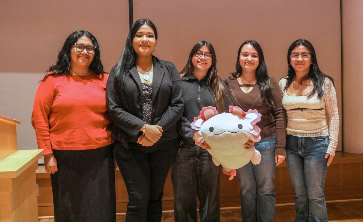 From left: Judith Rodriguez `27, Yessenia Alvarez Zamora `27, Becky Santizo-Zapeta `28, Jenifer Silva `27 and Elisabeth Zapata `27, all cabinet members of Grinnell College's chapter of the Society for Advancement of Chicanos/Hispanics and Native Americans in Science, hosted their first STEMsgiving celebration on Nov. 25, 2025.