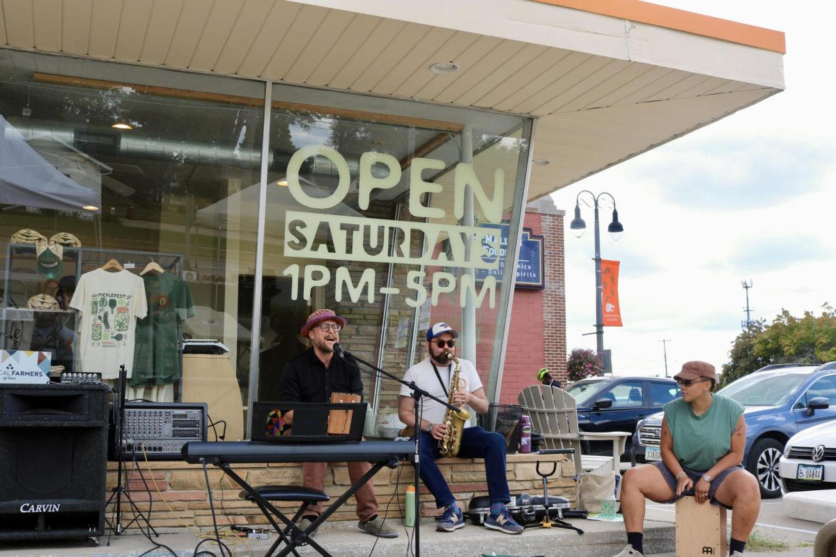 From left: Tony Perman, Mark Laver and Valeriya Woodward `25 played music from Mozambique and Zimbabwe at Grinnell Farm to Table’s Barbecue Party on Sept. 6, 2025.