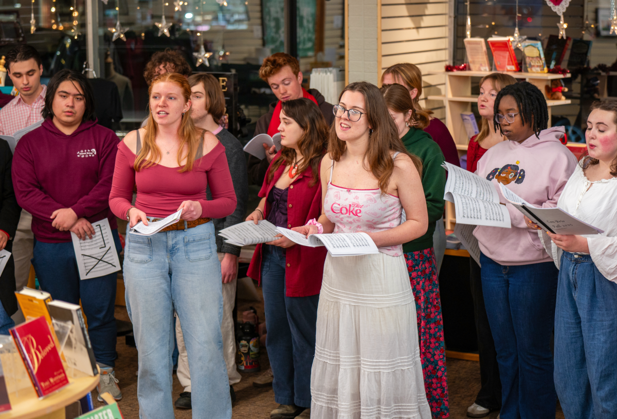 Con Brio, an acappella group, performs at the Pioneer Bookshop.