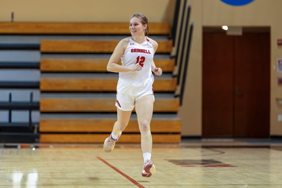 Reese Stephens (12) runs in front of empty stands at Darby Gymnasium in a game against Monmouth on Feb. 4, 2026.