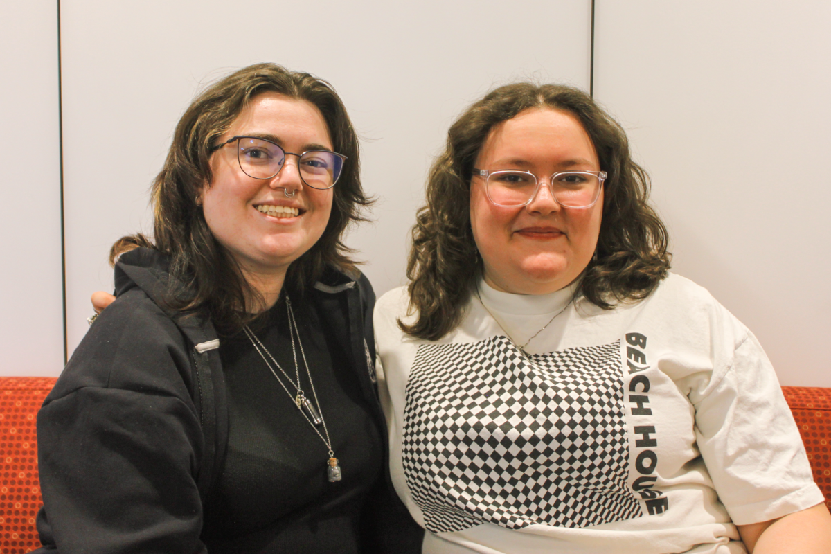 From left: Olivia Brightly `29 and Lily Lockwood-Keil `29 pose for a portrait. Brightly and Lockwood-Keil have restarted a chapter of the Sunrise Movement at Grinnell, which focuses on grassroots climate organizing and building community between students.