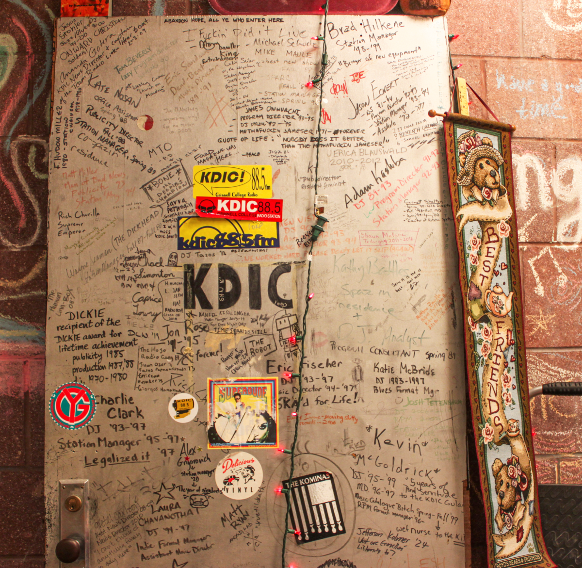 A door in KDIC’s booth that has been etched with the name and shownames
of alumni.