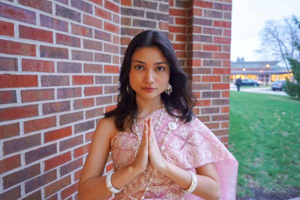 Virginia Oliver `28 stands outside of the Harris Center after her Cultural Evening performance.