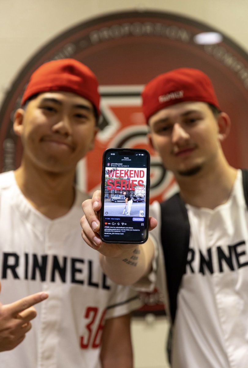 From left: Graphics designers Preston Yoshino `27 and Ben Skiles `28 show off their baseball Instagram post that they created on Photoshop.